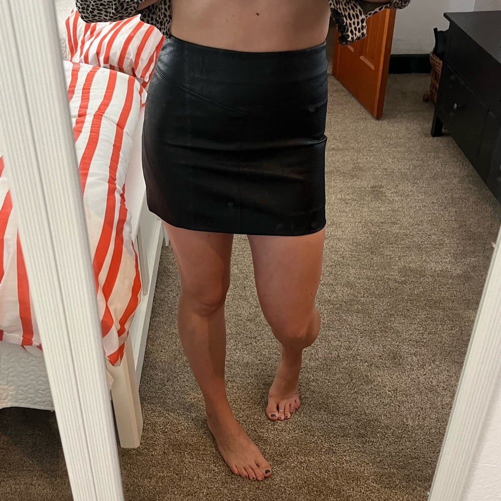 Black leather mini skirt